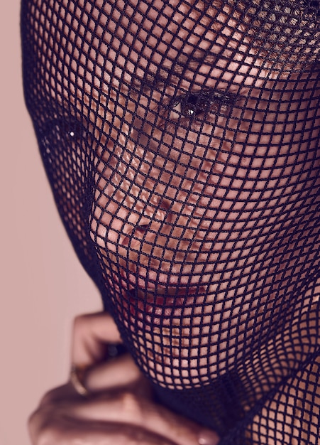 A close-up shot of a model wearing tech-integrated jewelry, focusing on the intricate details and seamless blend of technology and fashion.