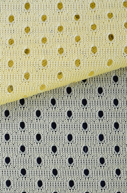 A close-up shot of fabric swatches showcasing classic prints like thin stripes, small polka dots, delicate floral patterns, and subtle animal prints (leopard or zebra). The swatches are neatly arranged to highlight their textures and patterns, with soft, natural lighting to show the colors accurately.