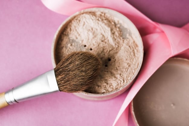 Close-up shot of various shades of bronzer powders and creams displayed on a marble vanity. A makeup brush rests beside them, ready for application.
