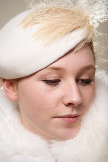 A close-up photo showing the improved skin texture and reduced pore size on a woman's cheek after several at-home chemical peel treatments. The skin looks smooth and radiant.