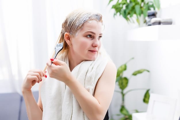 A woman carefully applying a thin layer of chemical peel solution to her clean face with a fan brush in a well-lit bathroom. She's wearing a headband to keep her hair out of her face.