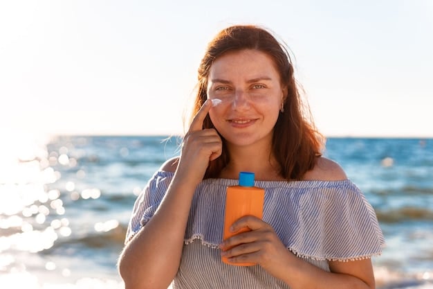 A woman applying sunscreen to her face, with sunglasses on her head. She is smiling and enjoying the sunshine, emphasizing the importance of sun protection for healthy skin.