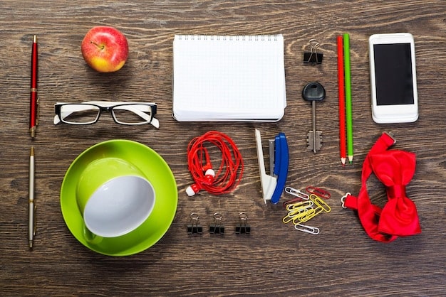A close-up shot of a variety of items that could be found in a Shein Mystery Box, including a colorful scarf, a piece of jewelry, a makeup brush, and a small handbag. The items are arranged artfully on a textured background.