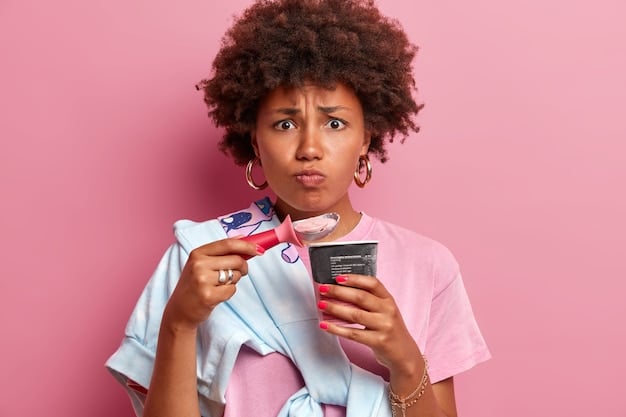 A person looking disappointed while holding up an ill-fitting or unflattering item from a Shein Mystery Box. The background is a messy closet, symbolizing the potential for unwanted items to clutter one's space.