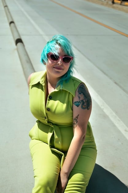 A close-up shot of a plus-size model wearing a trendy Shein outfit, highlighting the details of the clothing and the model's confident expression. This showcases the quality and appeal of Shein's plus-size fashion.