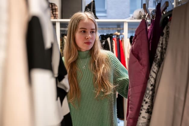 A close-up shot of a student happily browsing through racks of Shein clothing during the back-to-school sale. The student is holding a trendy top and smiling, with other shoppers and sale signage visible in the background.
