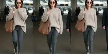 Celebrity in chic travel outfit at airport terminal