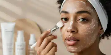 Woman applying a facial mask for glowing skin at home