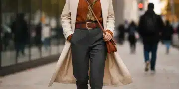 Stylish woman in layered autumn outfit 2026